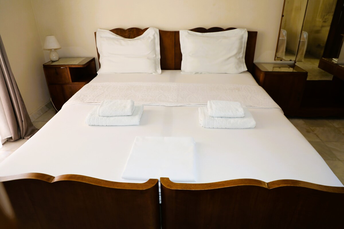 One of the six bedrooms inside Akobara Villa